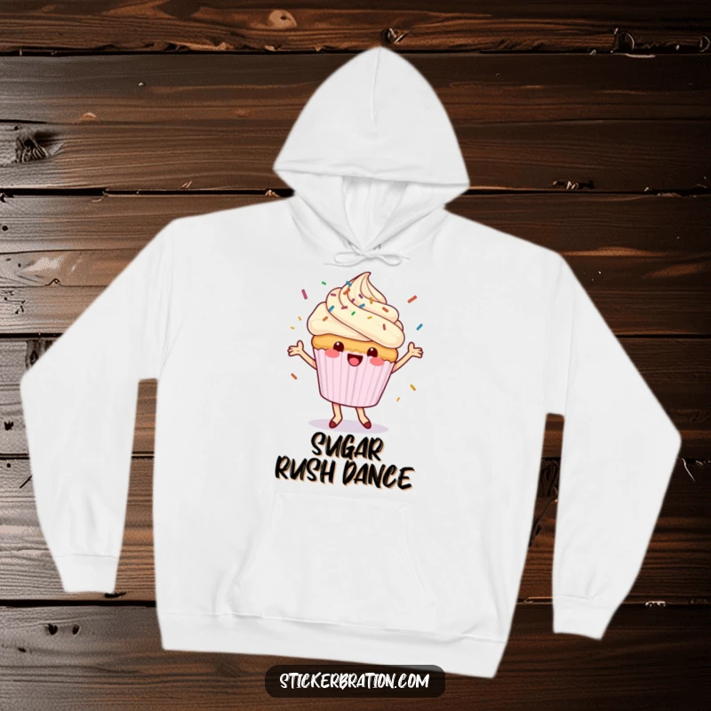 Funny cupcake hoodie with a dancing character happily showering sprinkles, providing cozy warmth and a sweet, joyful vibe.