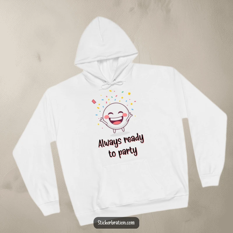 Funny hoodie featuring a round character with a huge grin, throwing confetti, perfect for cozy celebrations.