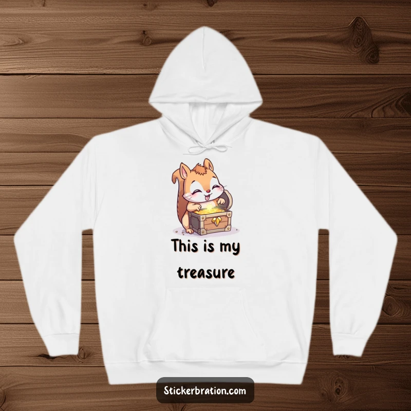 Funny Squirrel Treasure Hoodie: A cozy, curious squirrel discovers a glittering treasure chest, embodying fun and adventure.