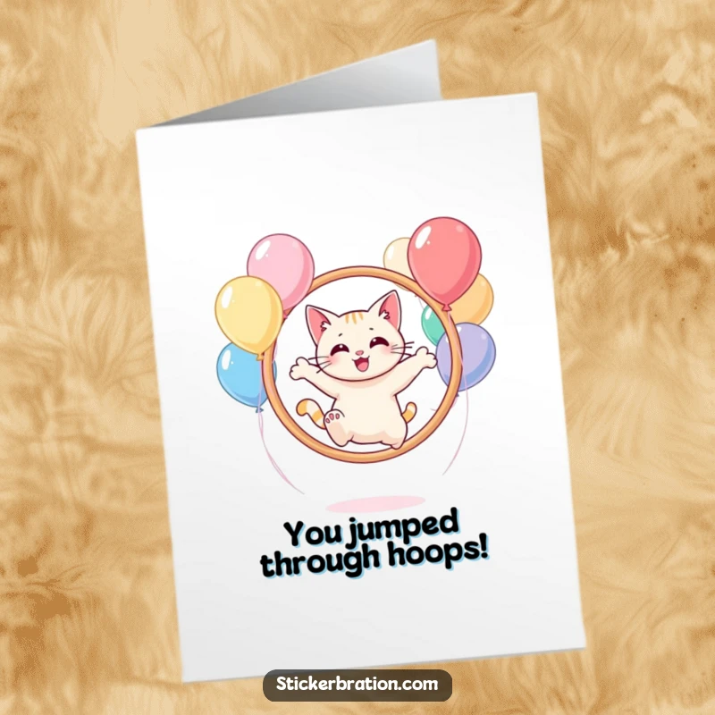 Funny Free Printable congratulations card featuring a delighted cat mid-leap through a vibrant hoop made of balloons, celebrating a win.